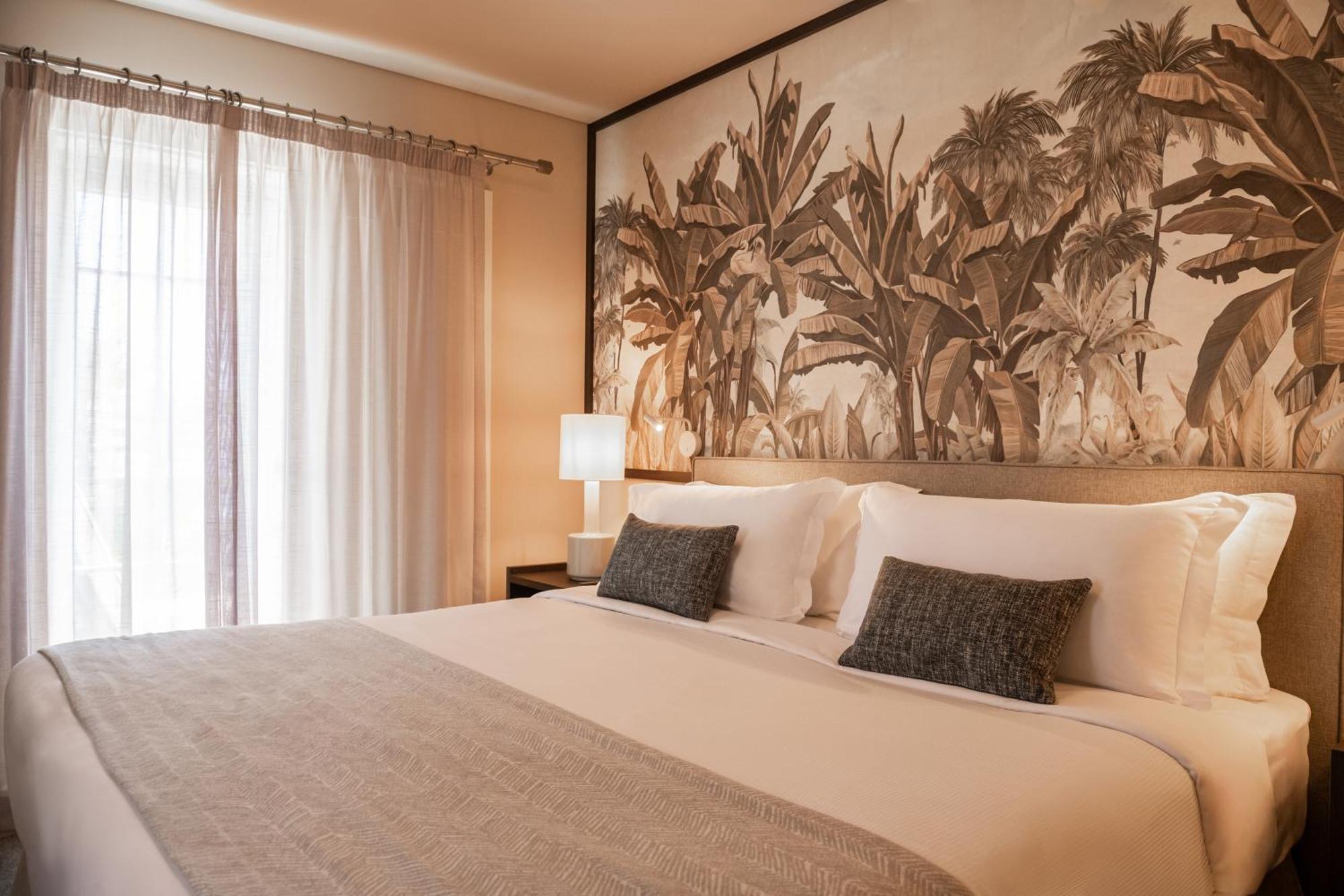 Domes Lake Algarve, Autograph Collection Виламура Экстерьер фото A bedroom at the hotel