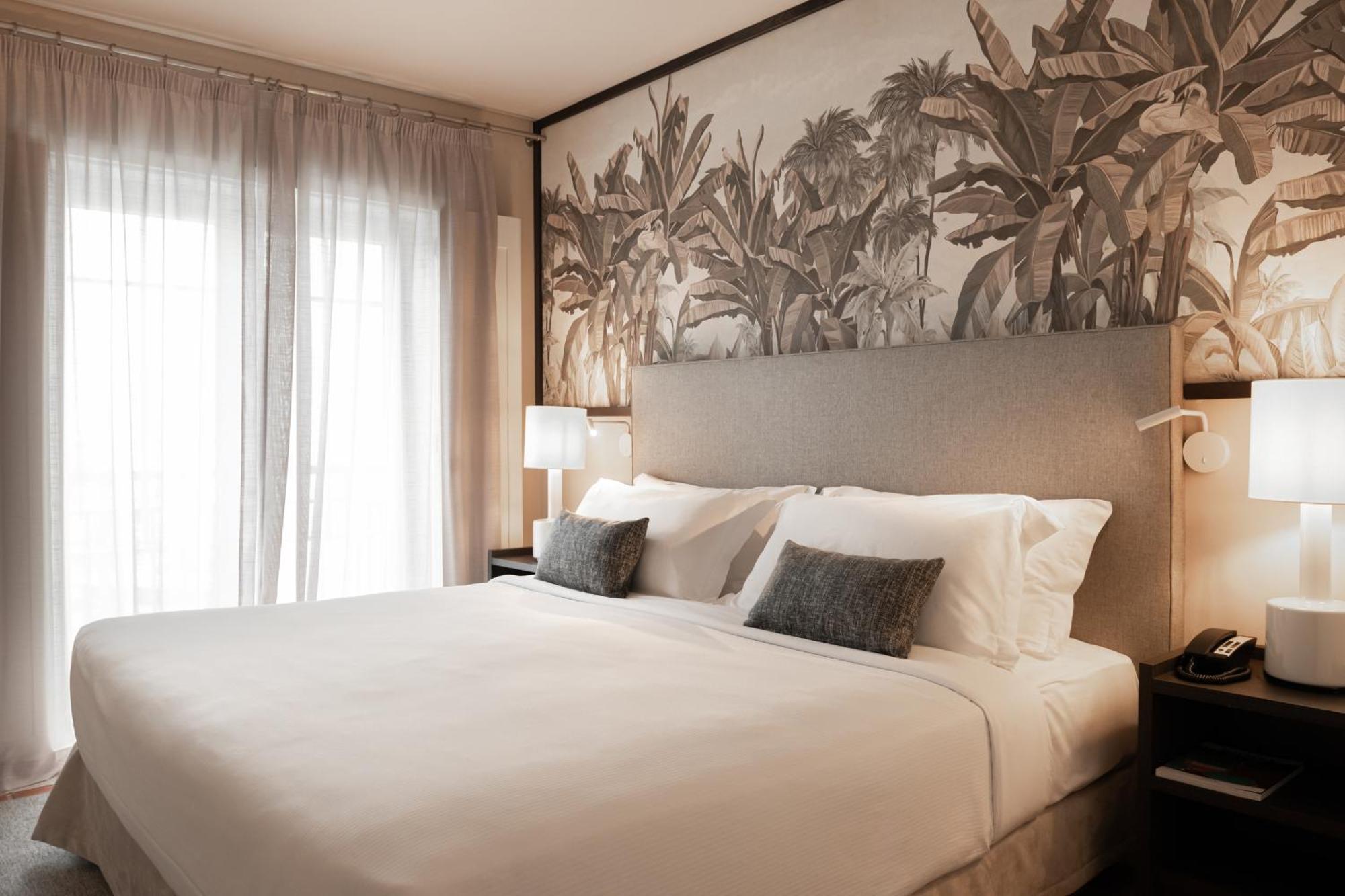 Domes Lake Algarve, Autograph Collection Виламура Экстерьер фото A bedroom at the hotel